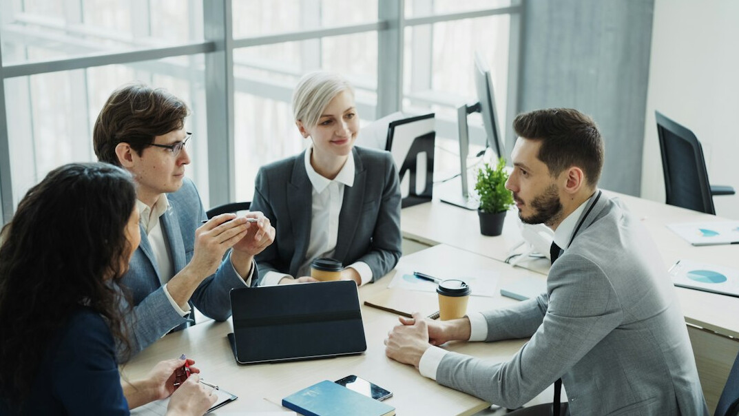 diverse professionals meeting